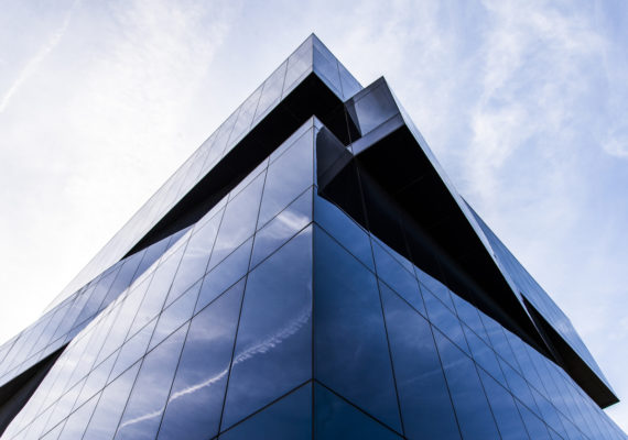 A modern office building situated in a business district in Santander, Spain.